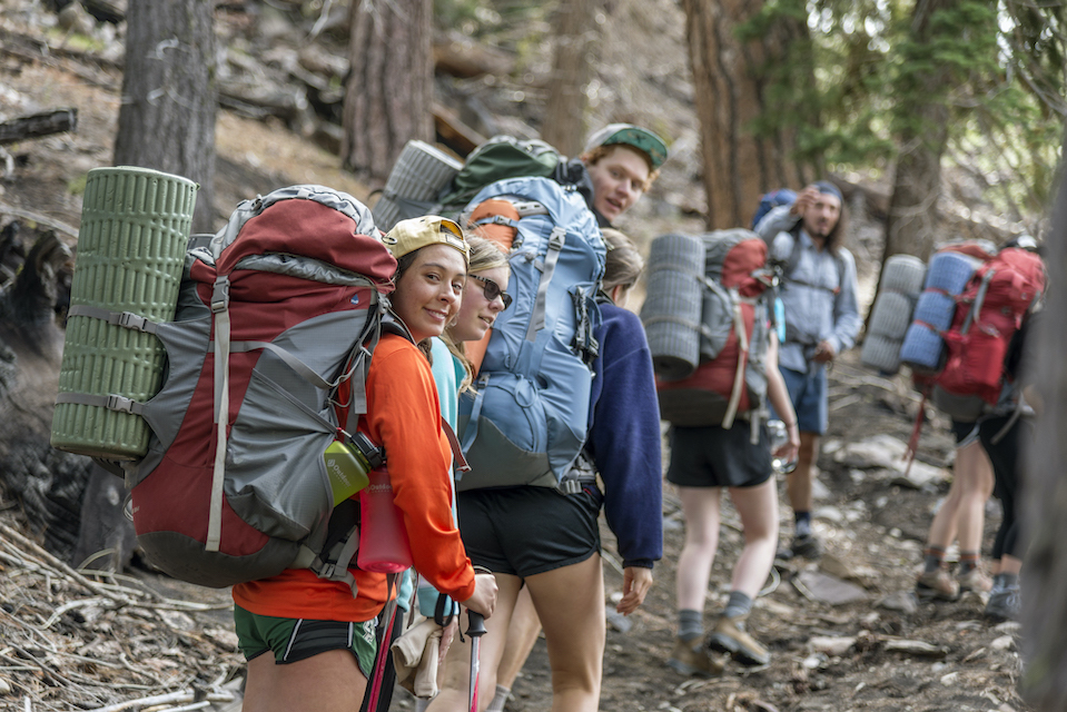 Photo of students backpacking