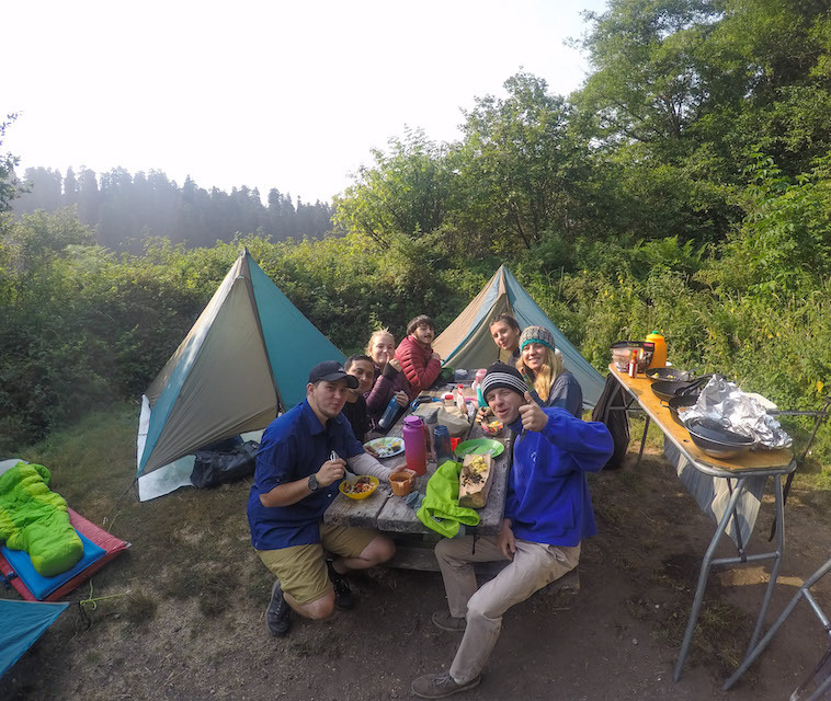 Photo of students in a campsite