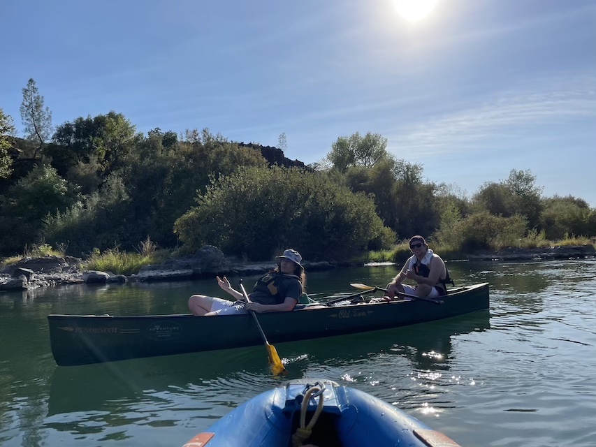 Photo of students relaxing in a canoe