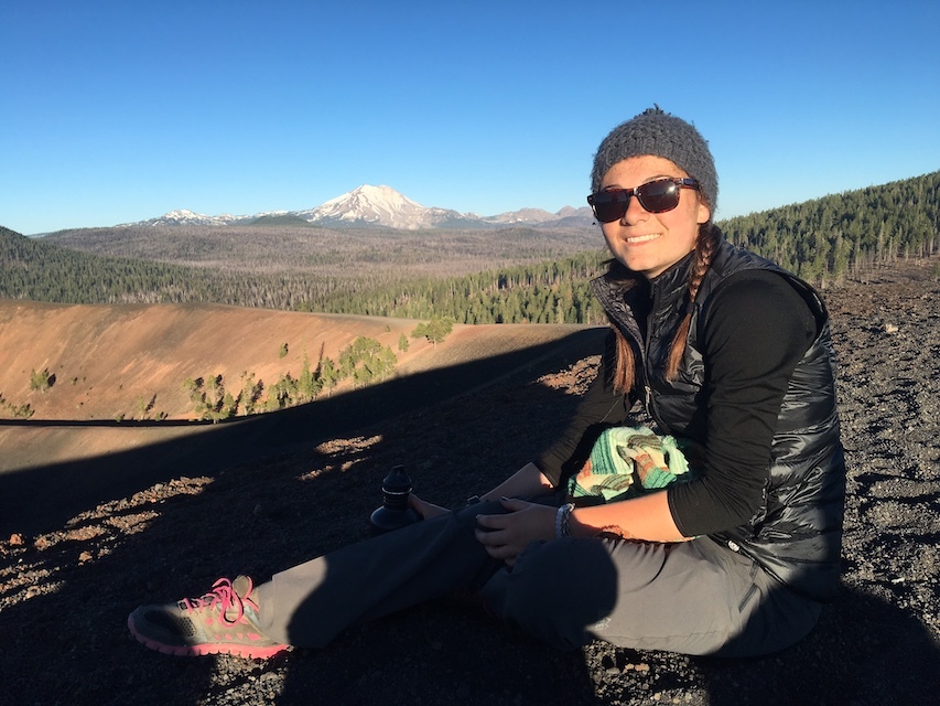 Photo of a student on a mountain top