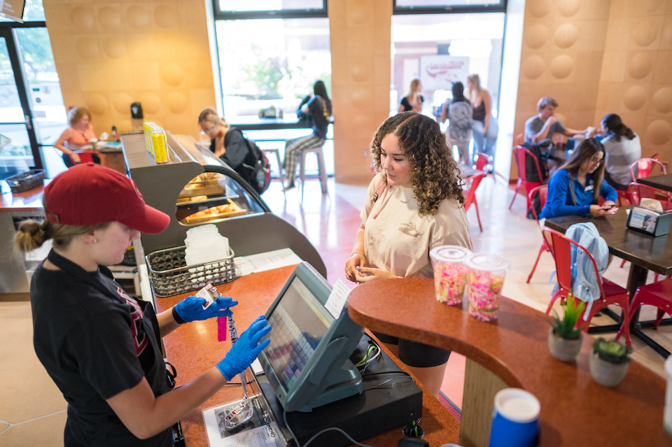 Photo of students serving food