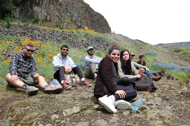 Photo of sustainability interns and staff head to see wildflowers at table mountain.