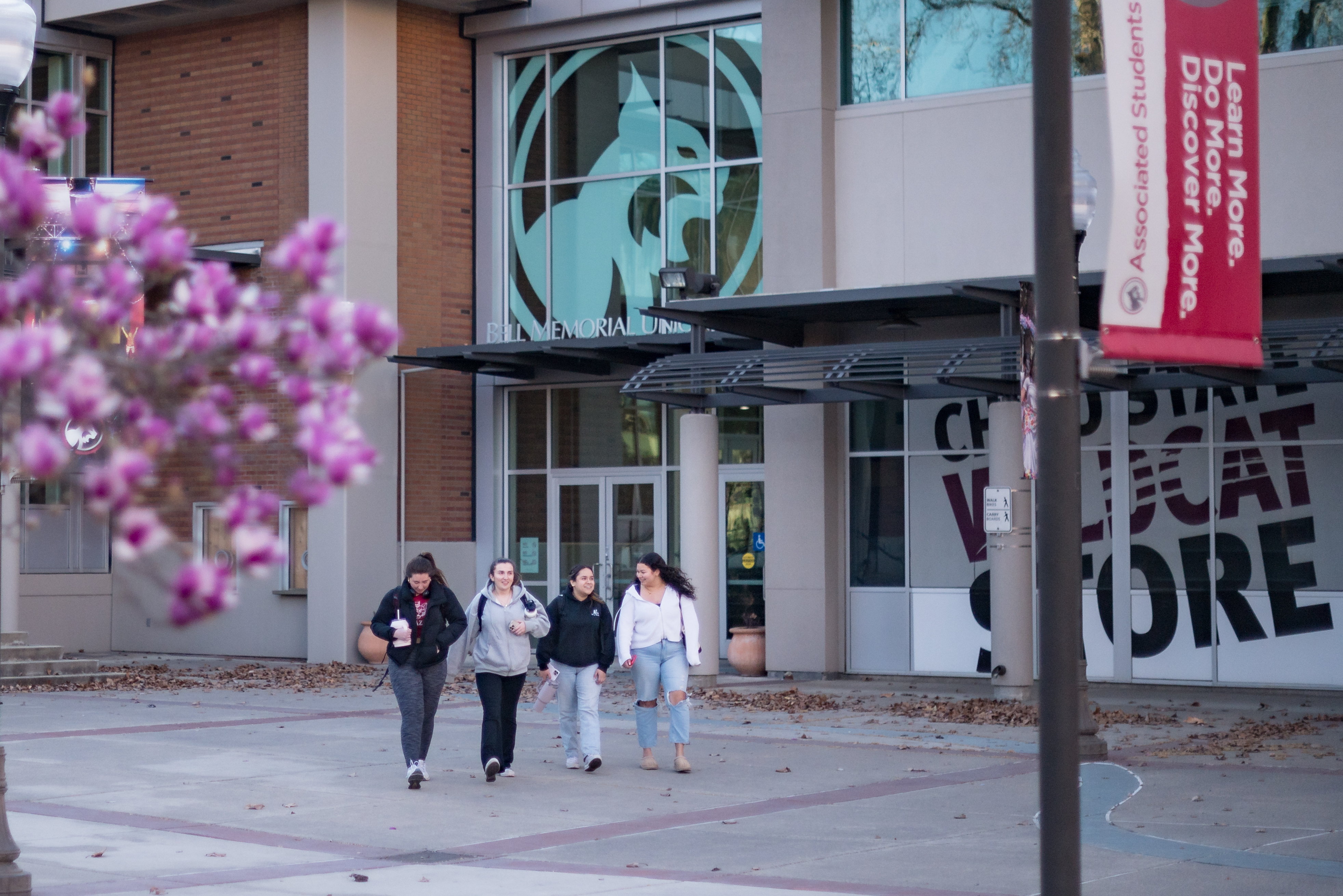 Students walking outside of the Bell Memorial Union.