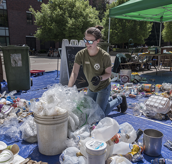 Photo of woman sorting recycling